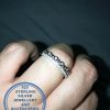 925 Sterling Silver Ring with a set of 2 bands with cubic detail. 1 with round tube settings.