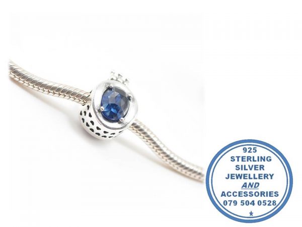 925 Sterling Silver Large O Charm with light blue middle. Pandora Compatible